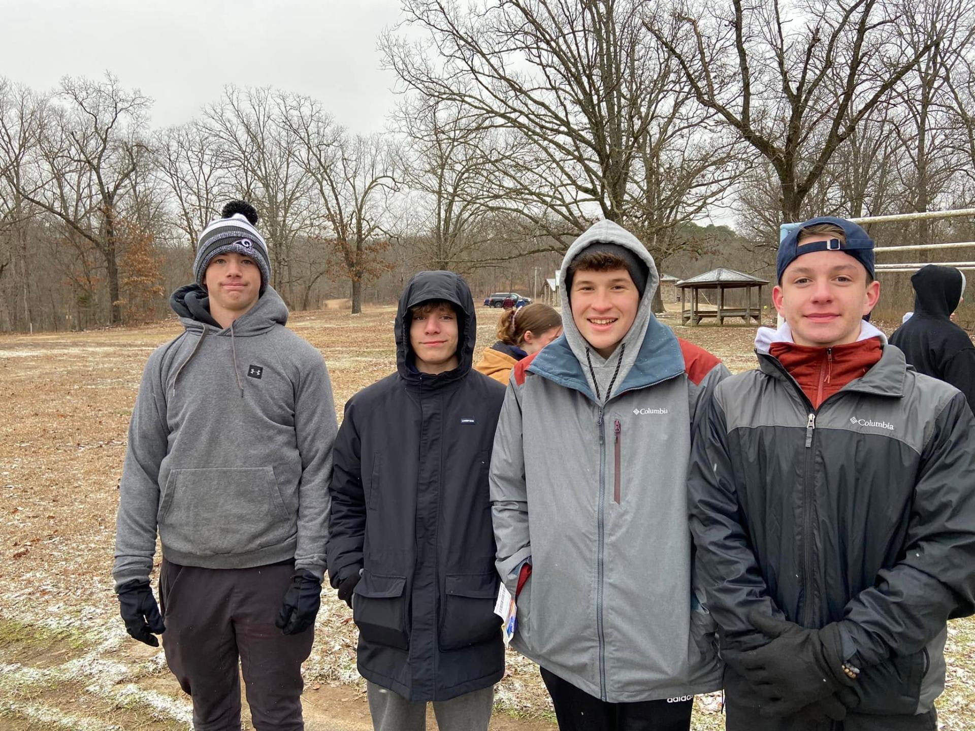 Young adults gathered together outdoors