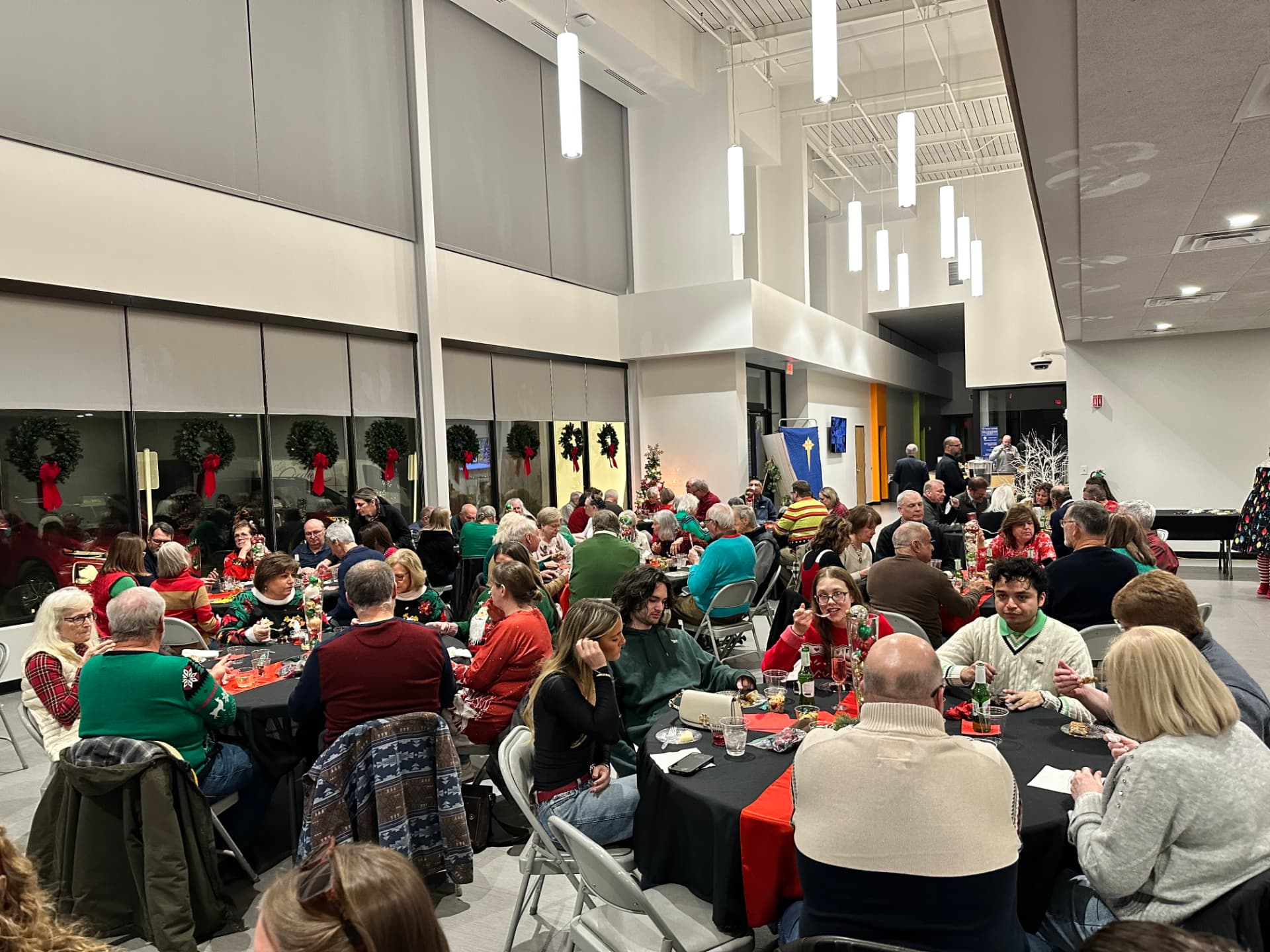 The CTR fellowship hall filled with members at the Christmas party dinner